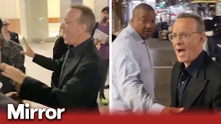 'Back the f*** off' Tom Hanks screams at fans after wife knocked over by mob