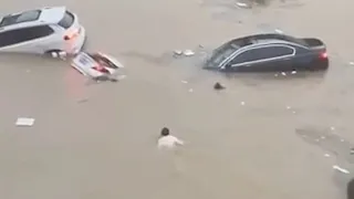 GLOBALink | Footage shows heroes saving lives on highway of China's flood-hit Henan