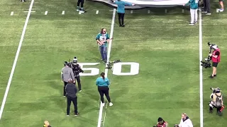 Paul Wane playing the national anthem at the Jags game.