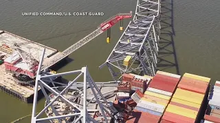 Video shows progress in clearing containers from Key Bridge collapse site