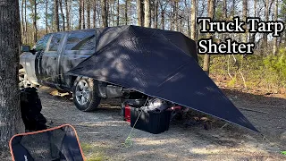OVERNIGHT CAMP IN A TRUCK TARP SHELTER