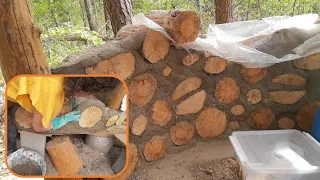 Round Cordwood outhouse