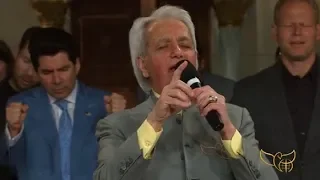 Benny Hinn sings "Breathe Upon Me"