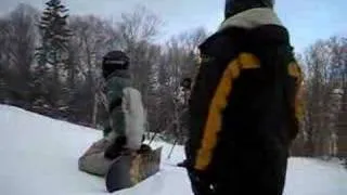 Venom and Batman snowboarding