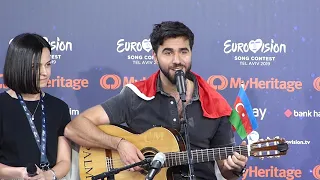 Chingiz singing 'Milim'  (Harel Skaat) during Press Conference (Tel Aviv)