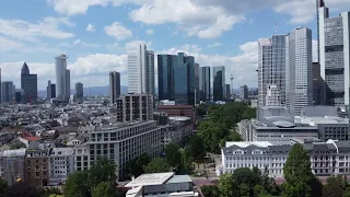 4K Drone Video Frankfurt Downtown sidewalk over Main River