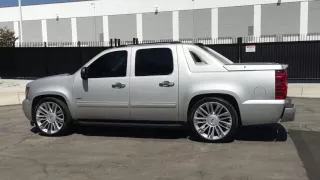 2011 Chevrolet Avalanche with a Crown Suspension 2/4 Lowering Kit