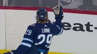 Patrik Laine goes top shelf for first playoff goal