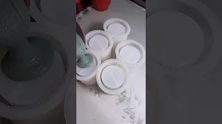 Pouring concrete candle jars
