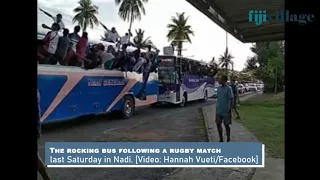 Passengers rocking a bus from side-to-side, following a rugby match