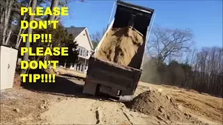 HUGE DUMP TRUCK ALMOST TIPS!!! Find out what happened & why...