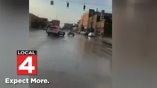 Video shows ATV rider speeding past police in Detroit