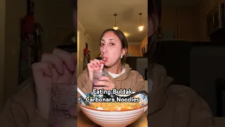 Eating buldak carbonara noodles