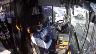 Bus Driver Comforts Crying Child After Mother Has Seizure on the Street