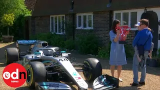 Lewis Hamilton gifts winning Formula One car and trophy to young terminally ill boy