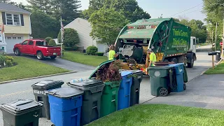 WM Garbage Truck Packing Heavy Summer Yard Waste