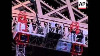 Roller blader drops from Eiffel Tower onto a 25m high pipe