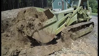 Cutting down trees and digging out a hillside