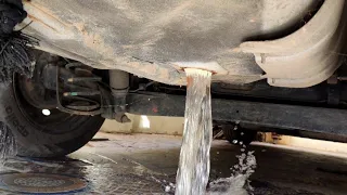 How to get water out of car spare wheel storage