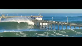 Waves Destroy OB Pier and take down surfer