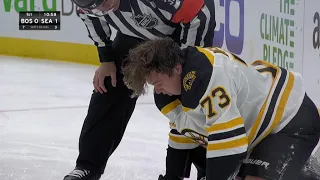 Charlie McAvoy shaken up after getting his head clipped by Wennberg's stick