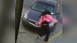 Mother Jumps on Car to Stop Carjacking