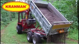 The Kranman Bison 8000 spreads gravel with DX220 tilt flap and electric vibro