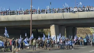 Israelis block highway in anti-judicial reform protest | AFP