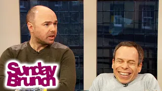 Karl Pilkington & Warwick Davis Joke With Each Other on Sunday Brunch