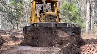 Cutting in a new log road with a Cat D5 dozer. Tire repair on the Komatsu WA250