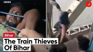 Viral Videos: Thief Dangles From Window After Failed Attempt; Another Swings By And Steals Phone