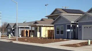 9 families move into new homes through Habitat for Humanity