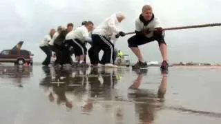All female team with 90 year old pulls 100,000 lb plane