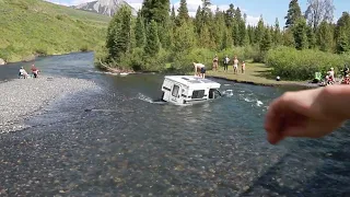 Truck getting Pulled out of the Slate River