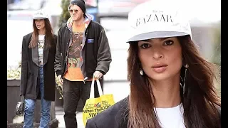 Emily Ratajkowski mixes business with pleasure wearing an over-sized blazer and jeans as she steps o