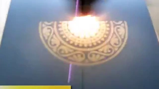 Лазерная гравировка зеркала со стороны амальгамы