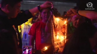 Duterte supporters burn De Lima mugshot