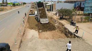 Technique Filling Stone Construction Foundation Expansion Road by  Operator Bulldozer Push Stone