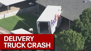 FedEx truck crashes into Tempe house