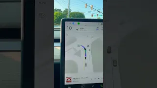 Tesla FSD Left Turn in Busy Intersection