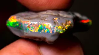 Grinding into this uncut rough opal the gems emerged