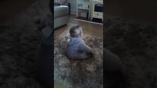 Baby laughing at Booba kids cartoon