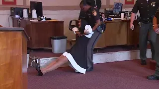 Former Judge Tracie Hunter dragged out of the courtroom, ordered to serve six months in jail