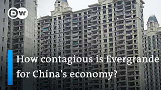 Housing crisis in China: Evergrande shares tank after re-entering trade | DW News