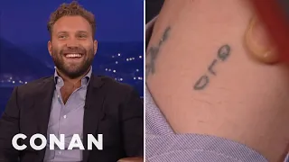 Jai Courtney Lost A Tattoo Bet With Margot Robbie | CONAN on TBS