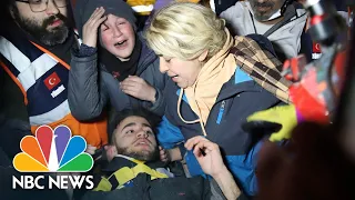 Watch: Tearful mom reunited with son rescued from collapsed building in Turkey