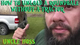 How to unload a roundbale without a tractor