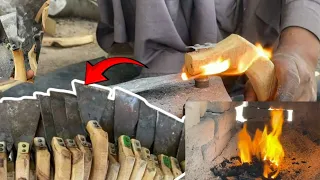 A Man Parforming His Art In A Hundred Year Old Way And Melting Iron With His Hands.