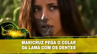 Coração Indomável - Maricruz pega o colar da Lama com os dentes