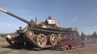 russian T-55  tank crushing car